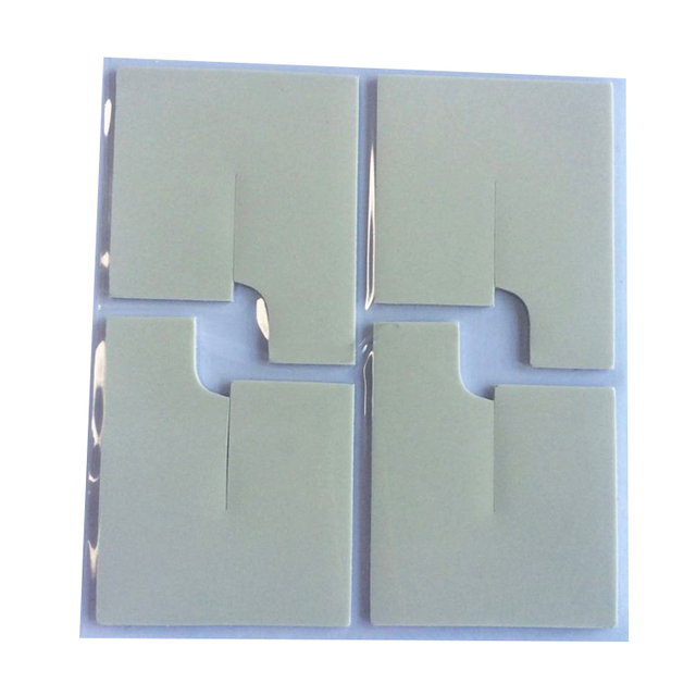 Isolation à feuilles thermiques 5 mm Thermal Conductor Silicone Gap Pad Silicone Thermal Isolation Pad Roll PC